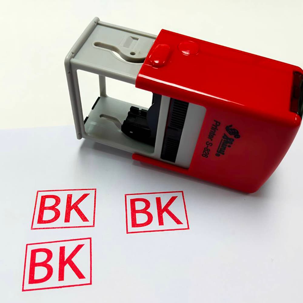 ตรายางข้อความ BK สีแดงแบบหมึกในตัว